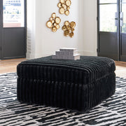 Midnight-Madness Onyx RAF Chase Sectional and Ottoman from Ashley - DMV Furniture