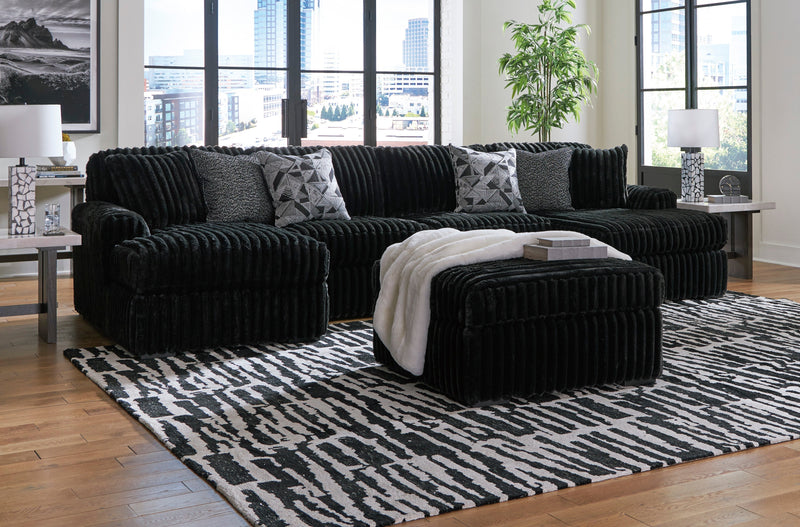 Midnight-Madness 3-Piece Sectional with Ottoman in Onyx from Ashley - DMV Furniture