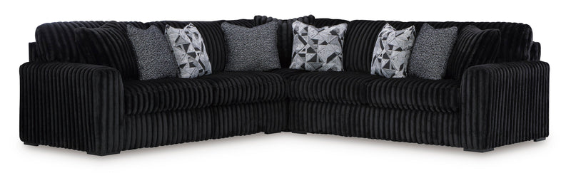 Midnight-Madness 3-Piece Sectional with Ottoman in Onyx from Ashley - DMV Furniture