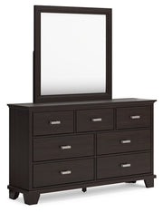 Covetown Dark Brown King Panel Bed with Mirrored Dresser from Ashley - DMV Furniture
