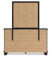 Covetown Dark Brown King Panel Bed with Mirrored Dresser from Ashley - DMV Furniture