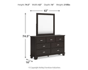 Covetown Dark Brown King Panel Bed with Mirrored Dresser from Ashley - DMV Furniture