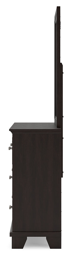 Covetown Dark Brown King Panel Bed with Mirrored Dresser from Ashley - DMV Furniture