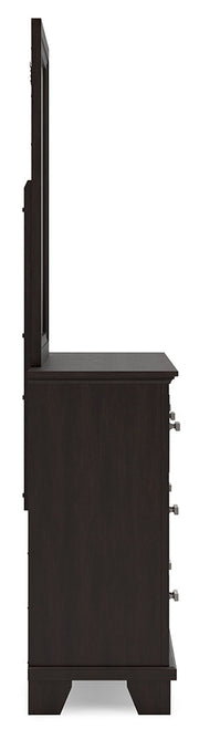 Covetown Dark Brown King Panel Bed with Mirrored Dresser from Ashley - DMV Furniture