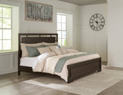 Covetown Dark Brown King Panel Bed with Mirrored Dresser from Ashley - DMV Furniture