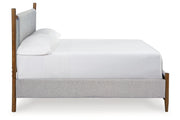 Lyncott Brown California King Upholstered Bed from Ashley - DMV Furniture