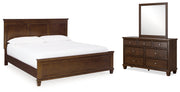 Danabr Brown King Panel Bed with Mirrored Dresser from Ashley - DMV Furniture