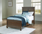 Danabrin Brown Twin Panel Bed with Mirrored Dresser from Ashley - DMV Furniture