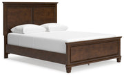 Danabrin Brown Queen Panel Bed with Mirrored Dresser from Ashley - DMV Furniture