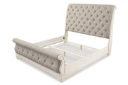 Realyn Chipped White California King Sleigh Bed from Ashley - DMV Furniture