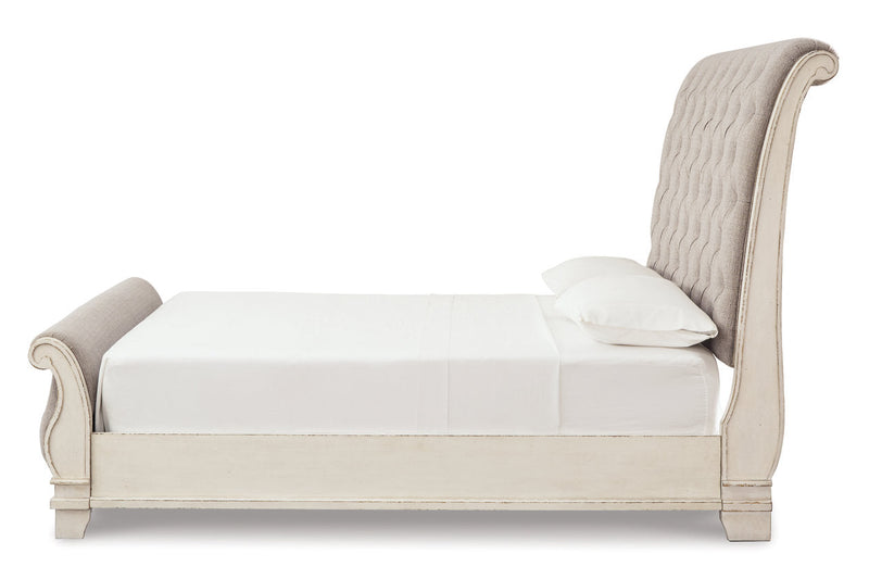 Realyn Chipped White California King Sleigh Bed from Ashley - DMV Furniture