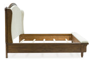 Sturlayne Brown California King Upholstered Panel Bed from Ashley - DMV Furniture