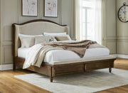 Sturlayne Brown California King Upholstered Panel Bed from Ashley - DMV Furniture