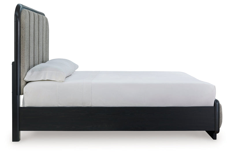 Rowanbeck Gray/Black Queen Upholstered Panel Bed with Mirrored Dresser from Ashley - DMV Furniture