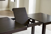 Neymorton Dining Table and 10 Chairs in Dark Grayish Brown from Ashley - DMV Furniture