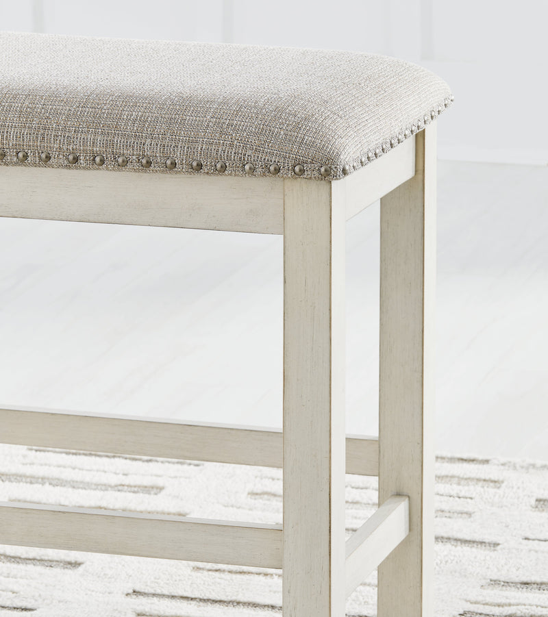Robbinsdale Antique White Counter Height Dining Table and 6 Barstools and Bench with Storage from Ashley - DMV Furniture