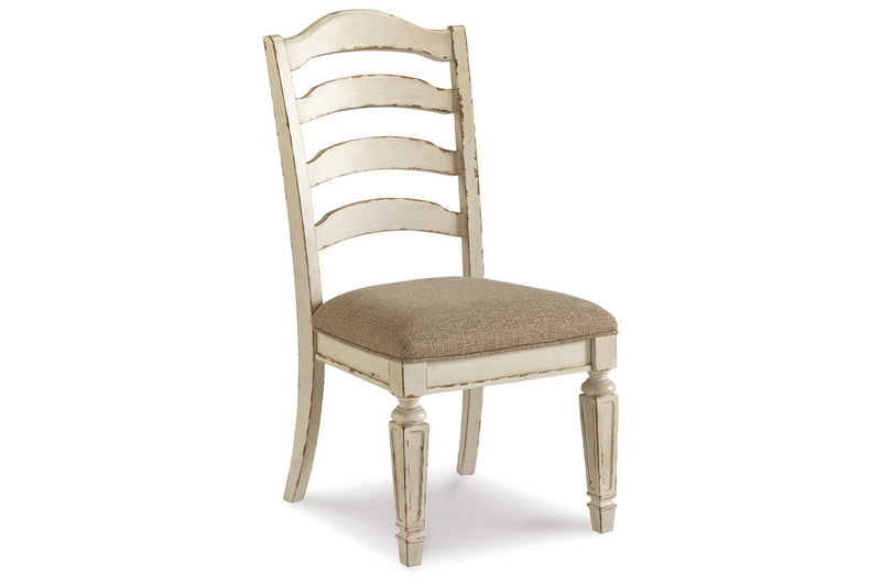 Realyn Chipped White Oval Dining Table and 4 Ladder Back Chairs from Ashley - DMV Furniture