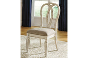 Realyn Chipped White Oval Dining Table and 4 Ribbon Back Chairs from Ashley - DMV Furniture