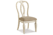 Realyn Chipped White Oval Dining Table and 4 Ribbon Back Chairs from Ashley - DMV Furniture