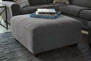 Ambee Slate 3-Piece Sectional with Ottoman from Ashley - DMV Furniture