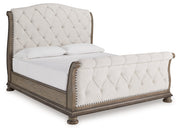 Ardenfield King Upholstered Sleigh Bed with Dresser and 2 Nightstands in Light Brown from Ashley - DMV Furniture