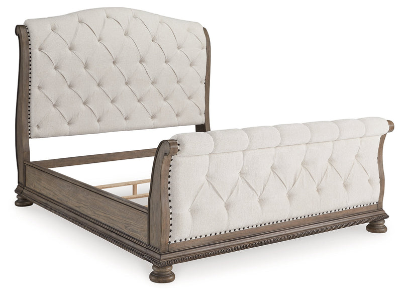 Ardenfield King Upholstered Sleigh Bed with Mirrored Dresser and Chest in Light Brown from Ashley - DMV Furniture