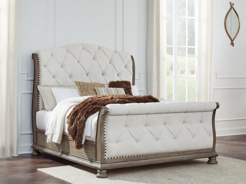 Ardenfield Queen Upholstered Sleigh Bed with Dresser in Light Brown from Ashley - DMV Furniture