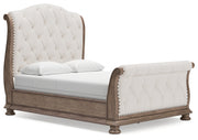 Ardenfield Queen Upholstered Sleigh Bed with Dresser in Light Brown from Ashley - DMV Furniture