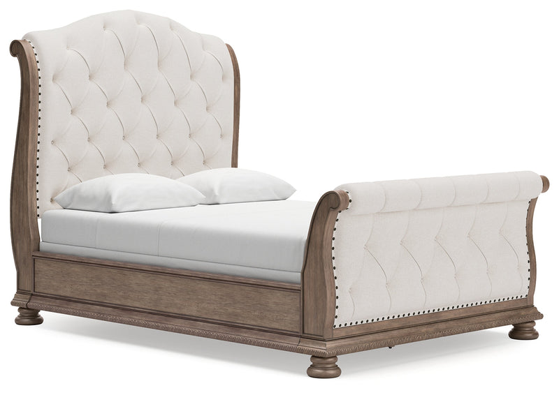 Ardenfield Queen Upholstered Sleigh Bed with Dresser in Light Brown from Ashley - DMV Furniture