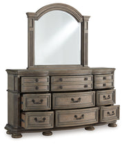 Ardenfield Queen Upholstered Sleigh Bed with Mirrored Dresser in Light Brown from Ashley - DMV Furniture