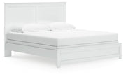 Bostwick Shoals King Panel Bed with Mirrored Dresser and Nightstand in White from Ashley - DMV Furniture