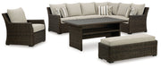 Brook Ranch Outdoor Sectional Set with Lounge Chair and Coffee Table in Brown from Ashley - DMV Furniture