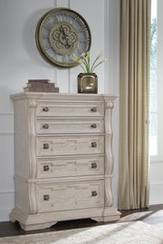 Bruchandi King Upholstered Panel Bed with Dresser and Chest in Antique White - PKG023749