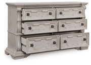 Bruchandi King Upholstered Panel Bed with Dresser and Chest in Antique White - PKG023749