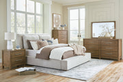 Cabalynn Light Brown Upholstered Panel Bedroom Set from Ashley - DMV Furniture