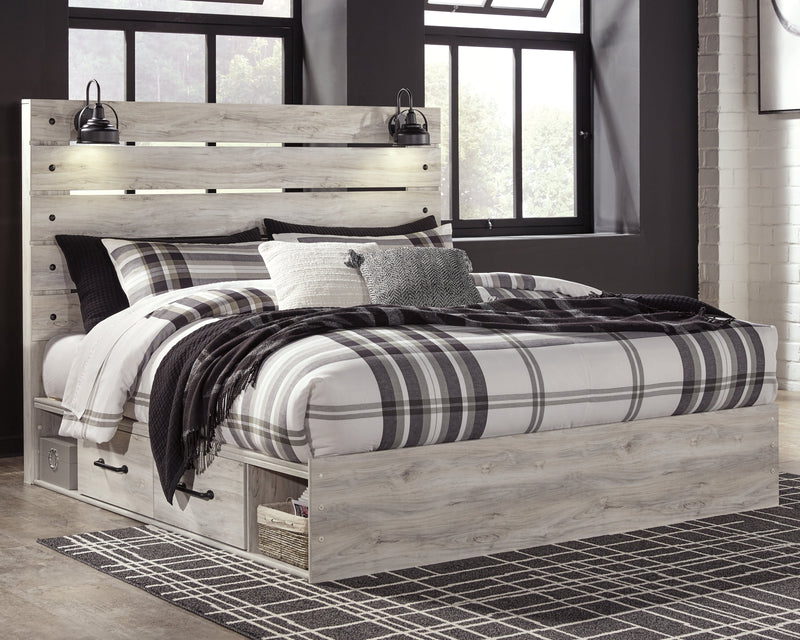 Cambeck King Panel Bed with 4 Storage Drawers with Mirrored Dresser and 2 Nightstands in Whitewash - PKG003027