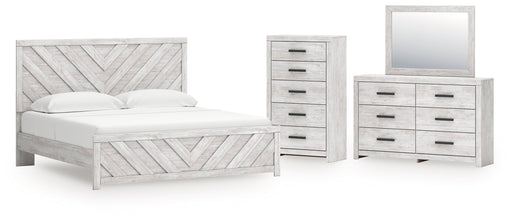 Cayboni King Panel Bed with Mirrored Dresser and Chest in Whitewash from Ashley - DMV Furniture