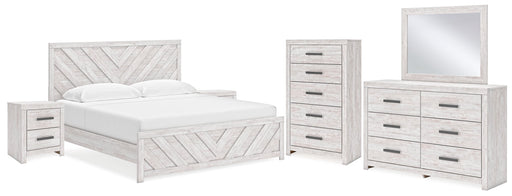 Cayboni King Panel Bed with Mirrored Dresser, Chest and 2 Nightstands in Whitewash - PKG019175