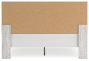 Cayboni King Panel Bed with Mirrored Dresser, Chest and Nightstand in Whitewash from Ashley - DMV Furniture