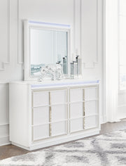 Chalanna King Upholstered Storage Bed with Mirrored Dresser and Nightstand in White from Ashley - DMV Furniture