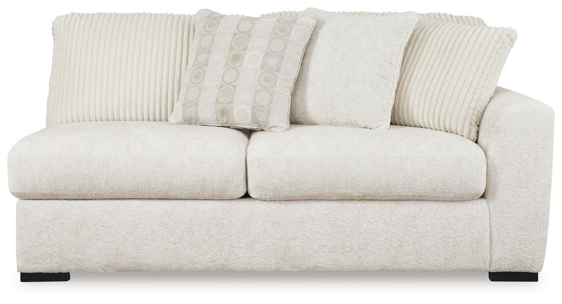 Chessington 2-Piece Sectional with Ottoman in Ivory - PKG018570
