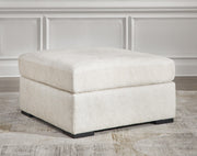 Chessington Ivory 4-Piece Sectional and Oversized Accent Ottoman - 61904U1