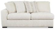 Chessington Ivory 4-Piece Sectional and Oversized Accent Ottoman - 61904U1