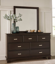 Covetown King Panel Bed with Mirrored Dresser, Chest and 2 Nightstands in Dark Brown - PKG016813