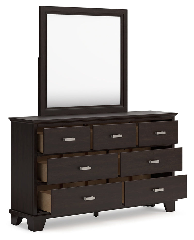 Covetown King Panel Bed with Mirrored Dresser in Dark Brown - PKG016811