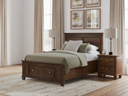 Danabrin Full Panel Storage Bed, Dresser, Mirror and Nightstand in Brown - PKG023934
