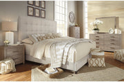 Dolante Beige King Upholstered Bed - DMV FurnitureKing Bed