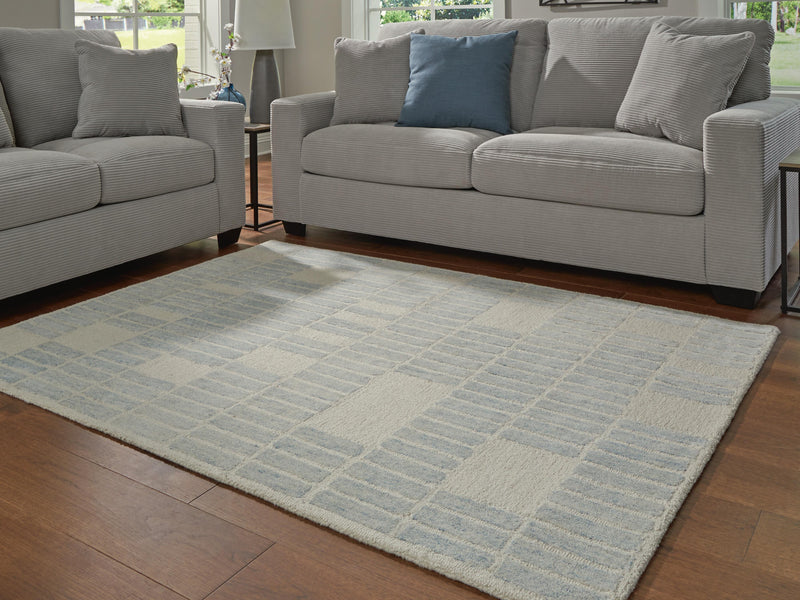 Dylanton Ivory/Blue 5' x 7' Area Rug - R407812