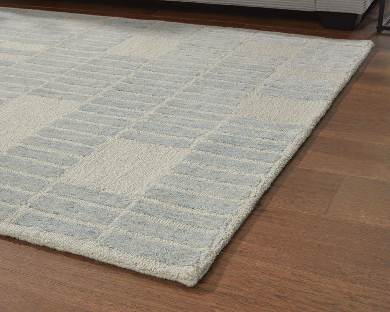 Dylanton Ivory/Blue 5' x 7' Area Rug - R407812