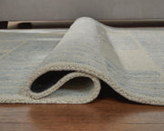 Dylanton Ivory/Blue 5' x 7' Area Rug - R407812